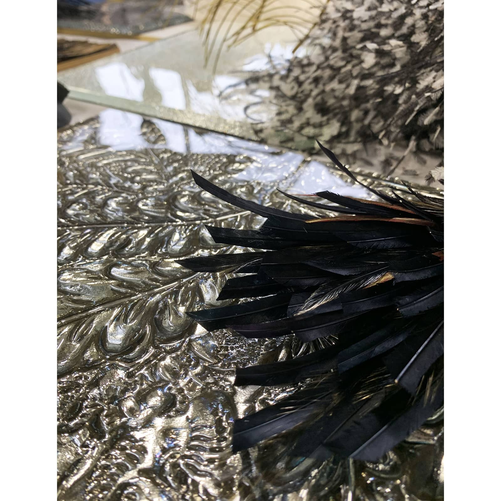 Arthylae-art-of-materials-glass-feathers-metal
